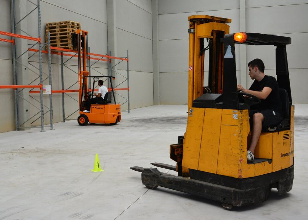 A picture of people taking part in forklift training