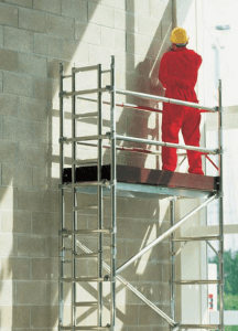 an image of a stationary platform being used to access higher windows in a construction project